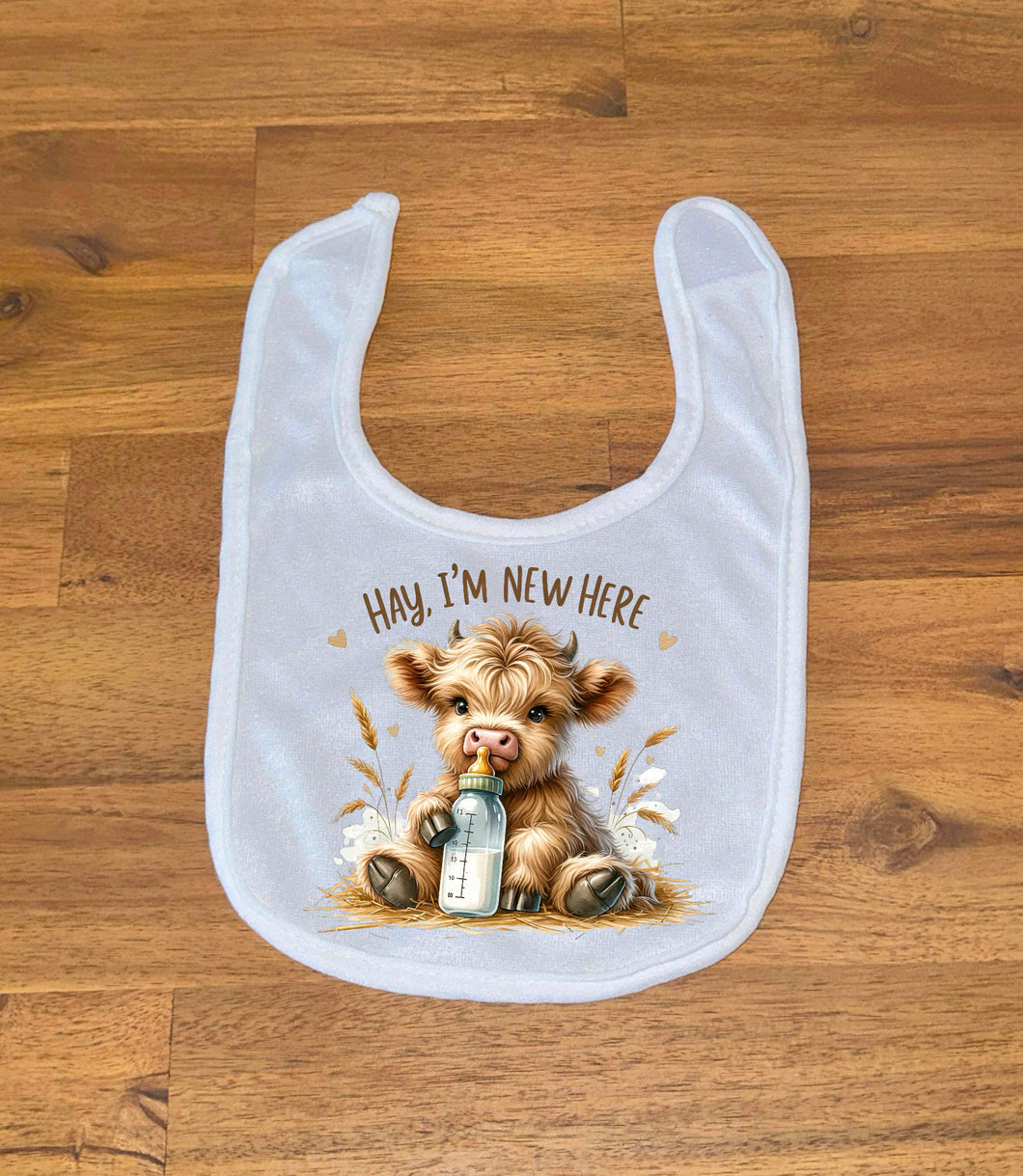 Printed Bib - New Here - Cow